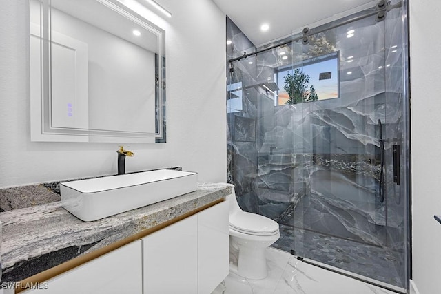 bathroom featuring walk in shower, vanity, and toilet