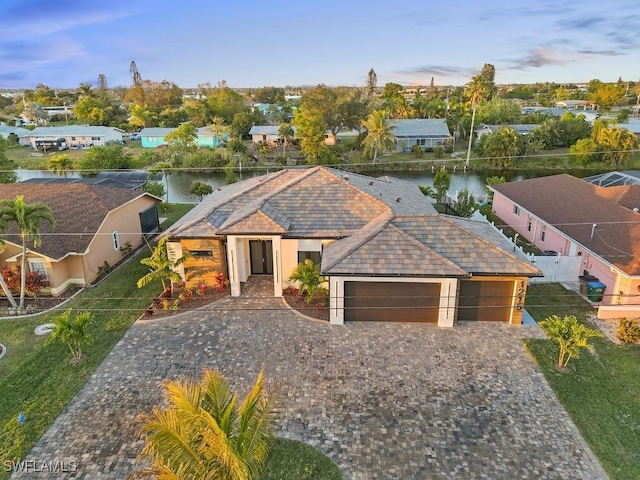 bird's eye view with a water view