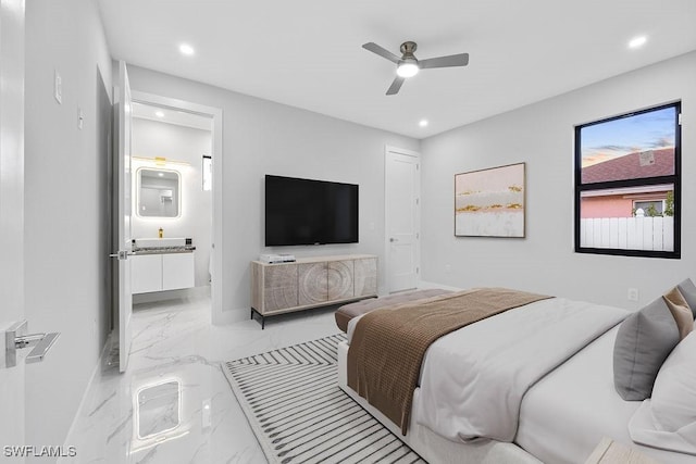 bedroom with ceiling fan and ensuite bathroom