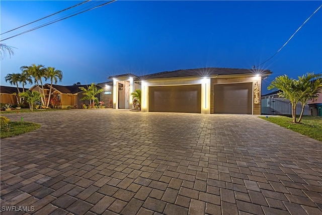 view of front of property featuring a garage