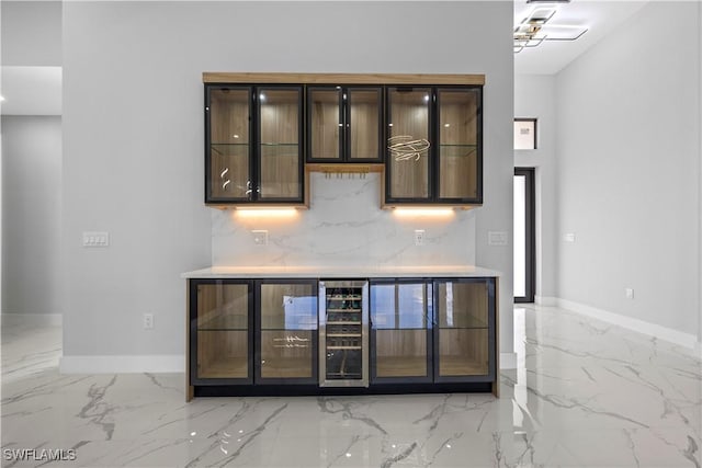 bar with wine cooler and backsplash