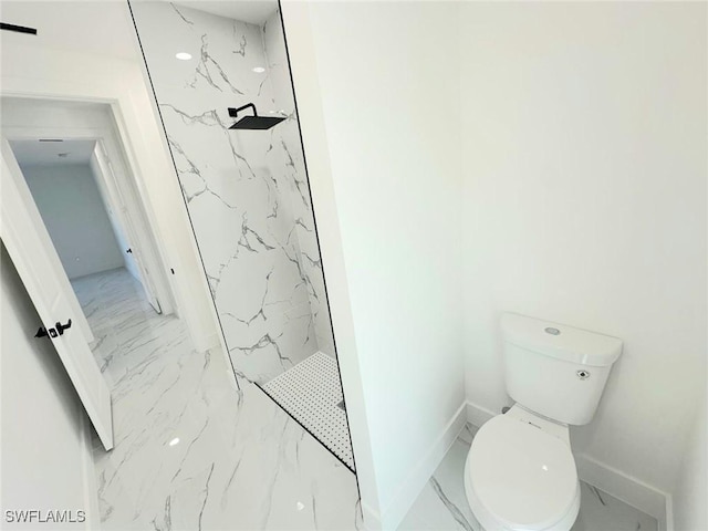 bathroom featuring a marble finish shower, baseboards, toilet, and marble finish floor