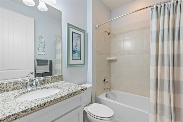 full bathroom featuring shower / bath combination with curtain, vanity, and toilet