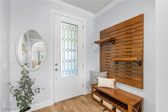 entrance foyer with crown molding and light wood-type flooring