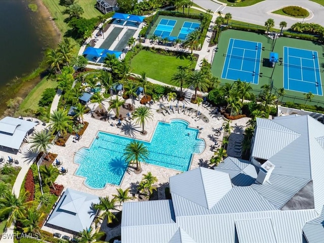 birds eye view of property with a water view