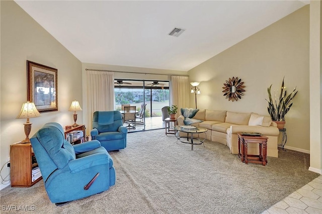 living area with carpet flooring, visible vents, vaulted ceiling, and baseboards