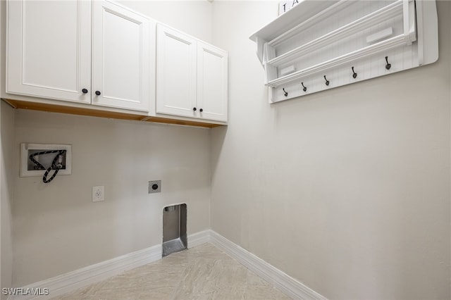 laundry area featuring electric dryer hookup, washer hookup, and cabinets