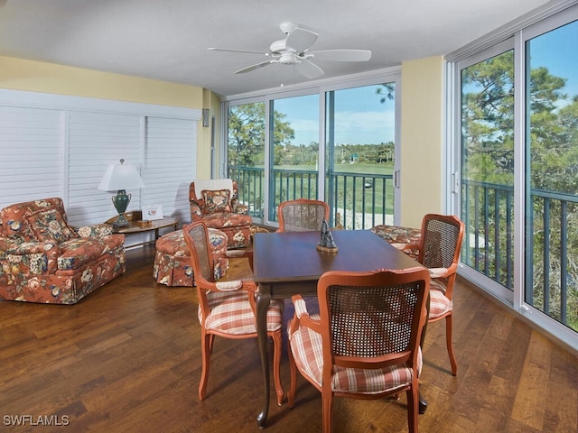 sunroom / solarium featuring ceiling fan