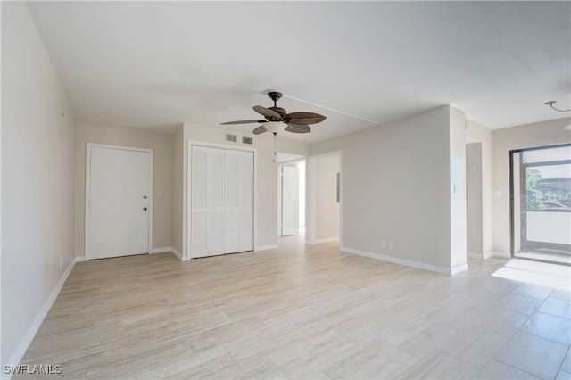 spare room featuring ceiling fan