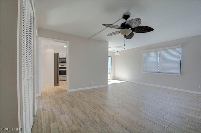 empty room with ceiling fan