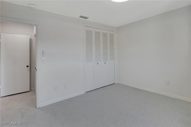 unfurnished bedroom featuring a closet