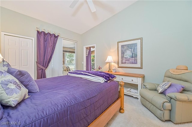 bedroom with lofted ceiling, ceiling fan, access to outside, light colored carpet, and a closet