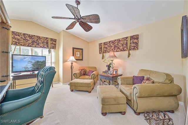 office space with ceiling fan, lofted ceiling, and carpet flooring