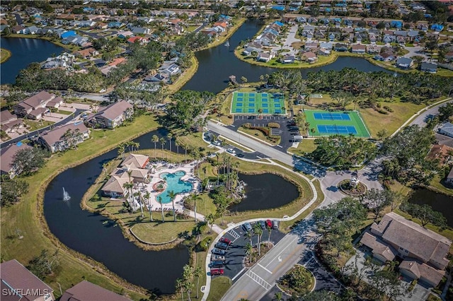 drone / aerial view with a water view