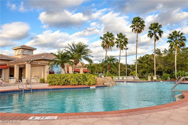 view of pool featuring a patio