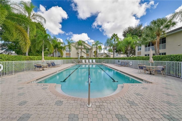 view of pool featuring a patio