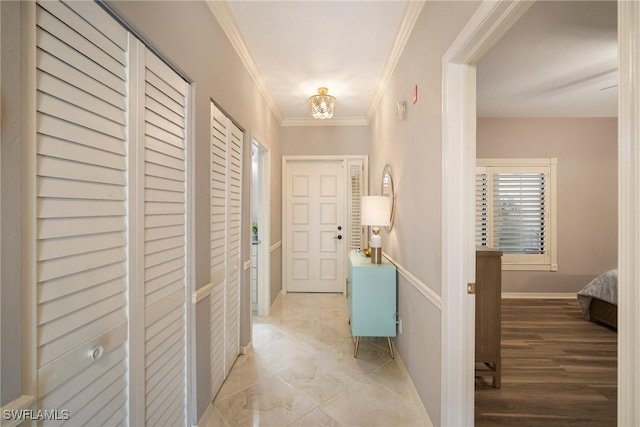 hallway featuring crown molding