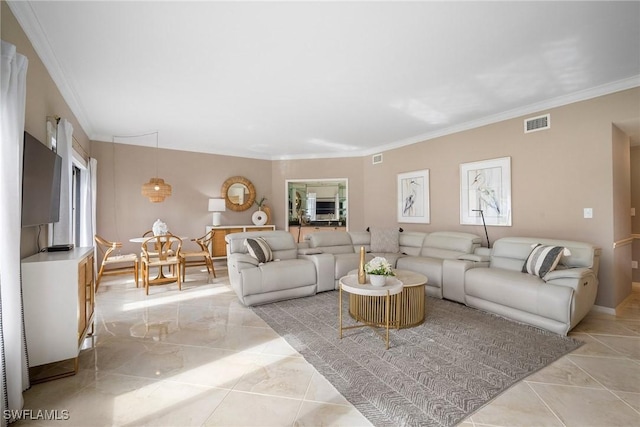 living room featuring crown molding