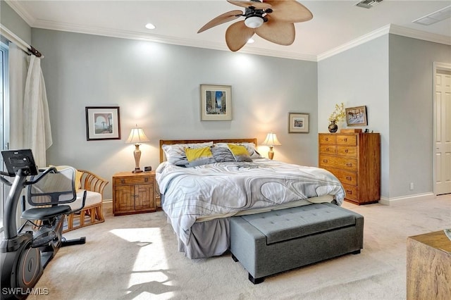 carpeted bedroom featuring ceiling fan and ornamental molding