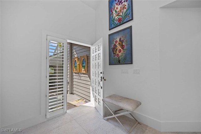 interior space with light tile patterned floors