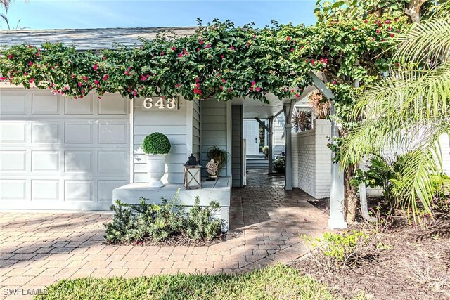 exterior space with a garage