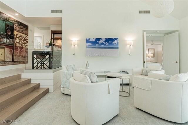 living room featuring vaulted ceiling