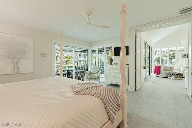 bedroom with ceiling fan, lofted ceiling, and access to exterior