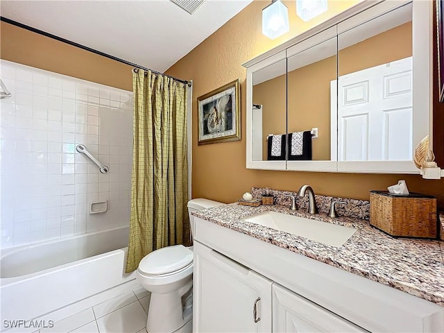 full bathroom featuring shower / tub combo with curtain, vanity, tile patterned flooring, and toilet