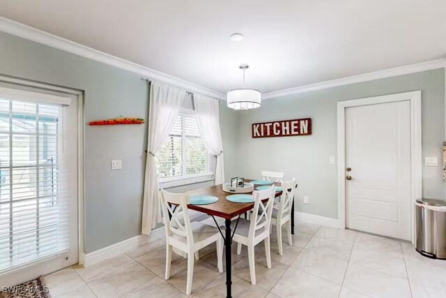 tiled dining space with crown molding