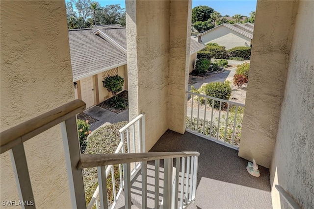 exterior space featuring carpet floors