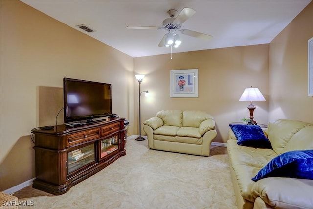 living room featuring ceiling fan