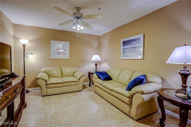 living room featuring ceiling fan