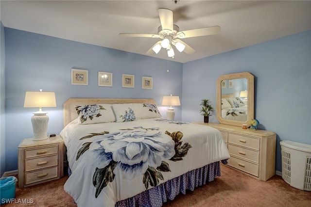 bedroom with dark carpet and ceiling fan