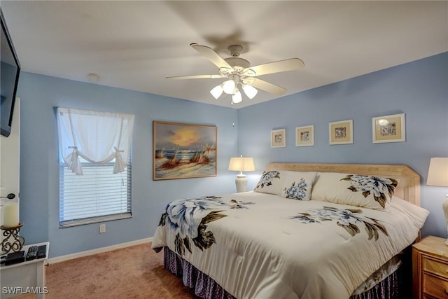 bedroom with ceiling fan and carpet