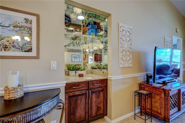 bar featuring light stone counters