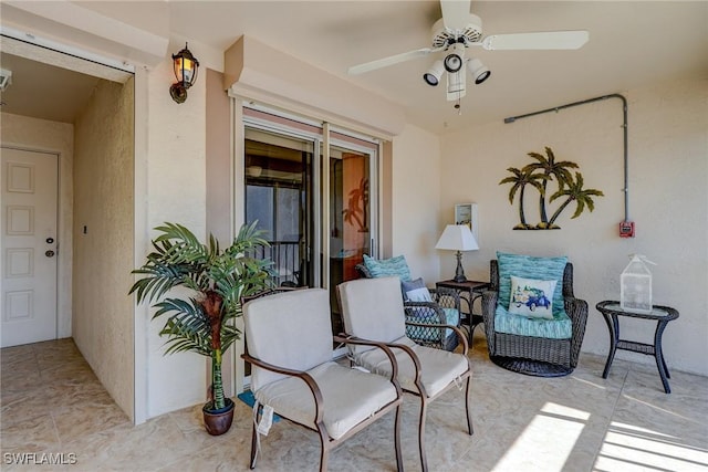 view of patio / terrace featuring ceiling fan