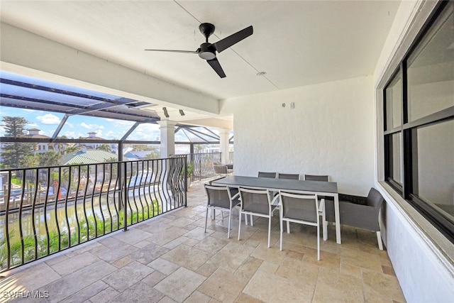 view of patio / terrace featuring a balcony and ceiling fan