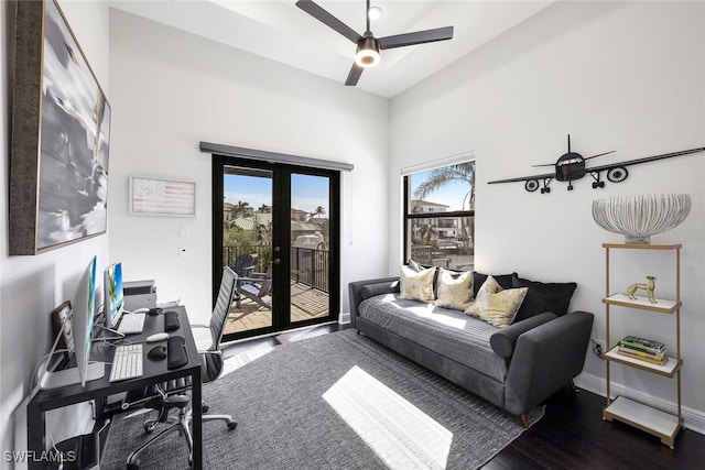 office with hardwood / wood-style flooring, french doors, and ceiling fan