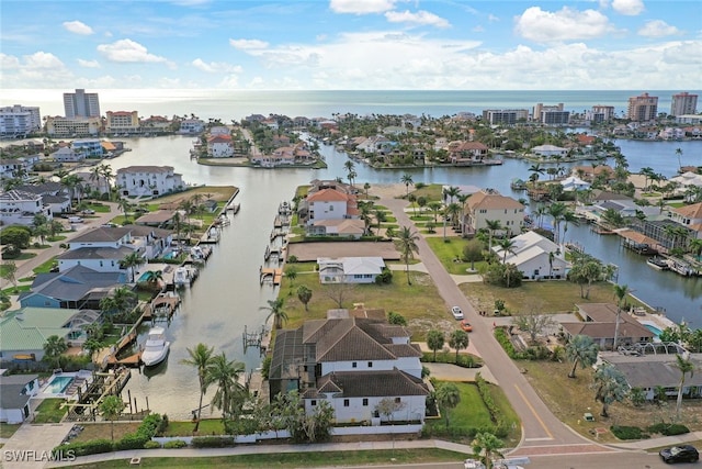 drone / aerial view featuring a water view