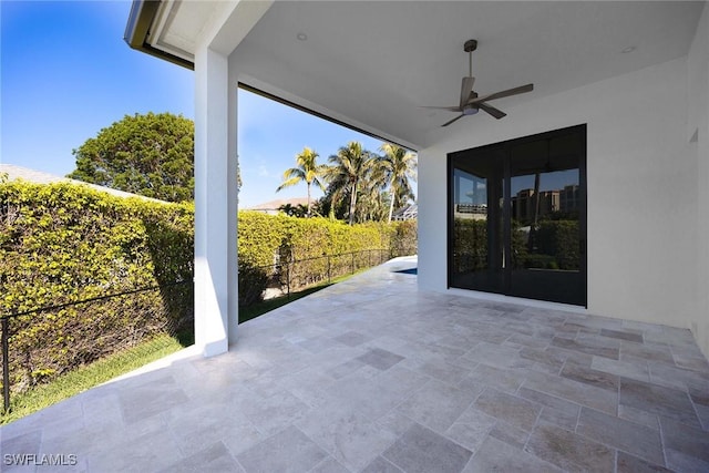 view of patio / terrace featuring ceiling fan