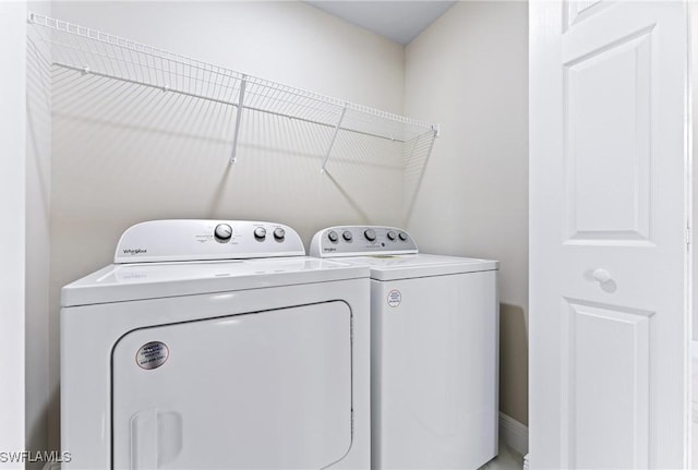 laundry room with washing machine and dryer