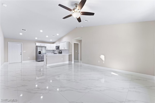 unfurnished living room featuring lofted ceiling and ceiling fan