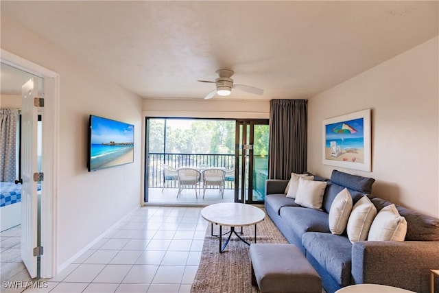 living room with light tile patterned floors and ceiling fan