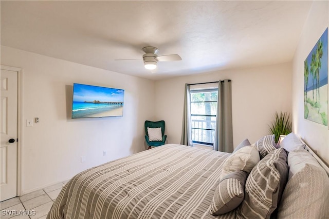 tiled bedroom with ceiling fan