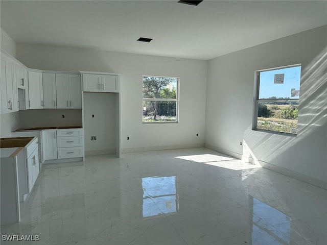 kitchen with white cabinets