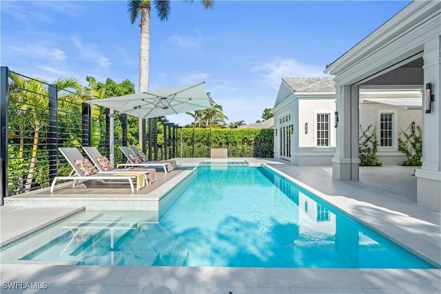 565 Anchor Rode Dr, Naples, FL 34103 - view of swimming pool featuring a fenced in pool and a patio
