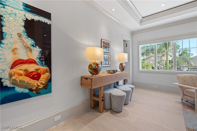 565 Anchor Rode Dr, Naples, FL 34103 - home office with baseboards, ornamental molding, recessed lighting, a raised ceiling, and wood finished floors