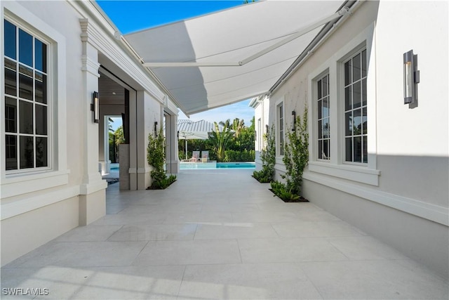 565 Anchor Rode Dr, Naples, FL 34103 - view of patio featuring an outdoor pool
