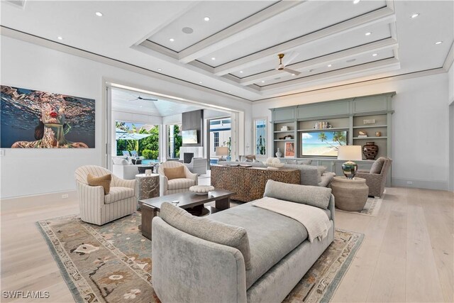 565 Anchor Rode Dr, Naples, FL 34103 - living area with crown molding, light wood finished floors, baseboards, and a ceiling fan