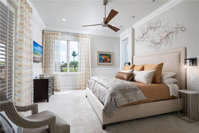 bedroom featuring crown molding, ceiling fan, and carpet